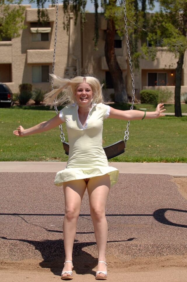21P Amateur babe Carissa shows her small tits and flashes her twat at a playground