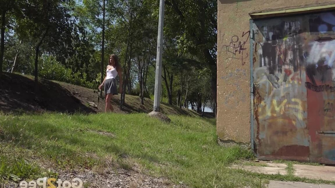 15P Sarah squats on tiptoes to relieve herself