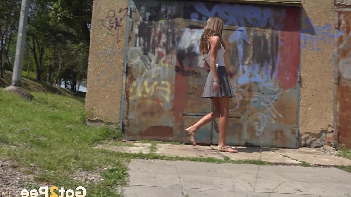 15P Sarah squats on tiptoes to relieve herself
