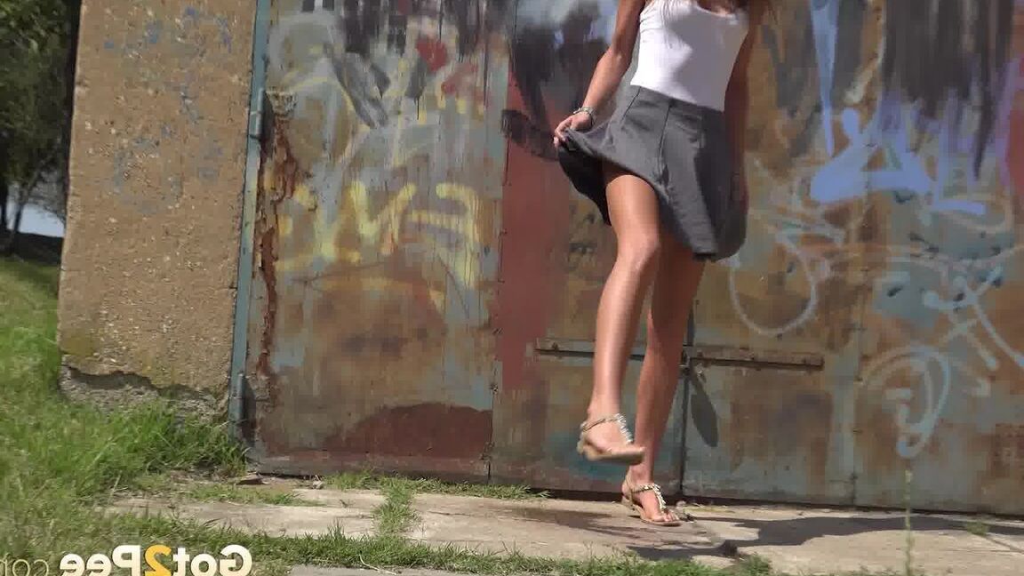 15P Sarah squats on tiptoes to relieve herself