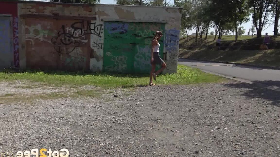 15P Sarah squats on tiptoes to relieve herself