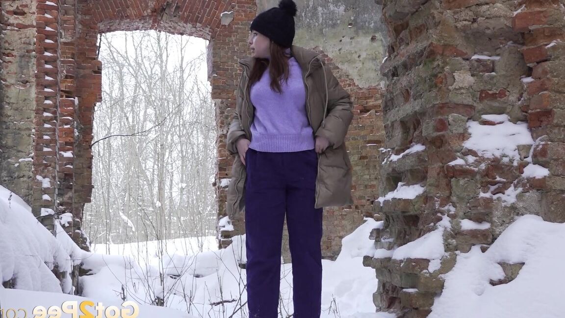 15P Cute brunette squats to piss in the snow