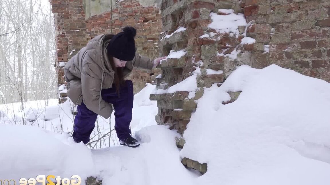 15P Cute brunette squats to piss in the snow