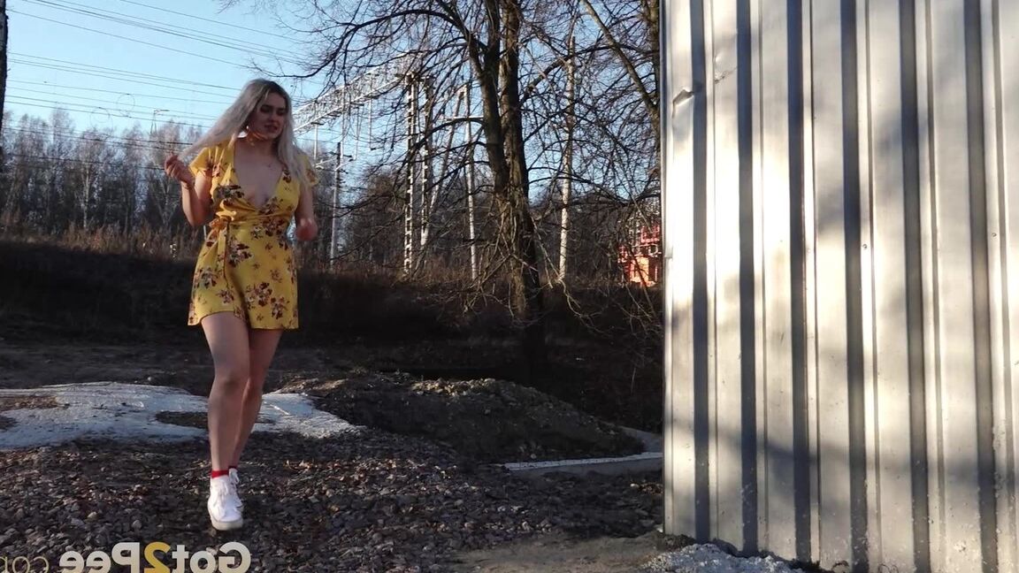 15P Blonde babe stands and pees while being filmed