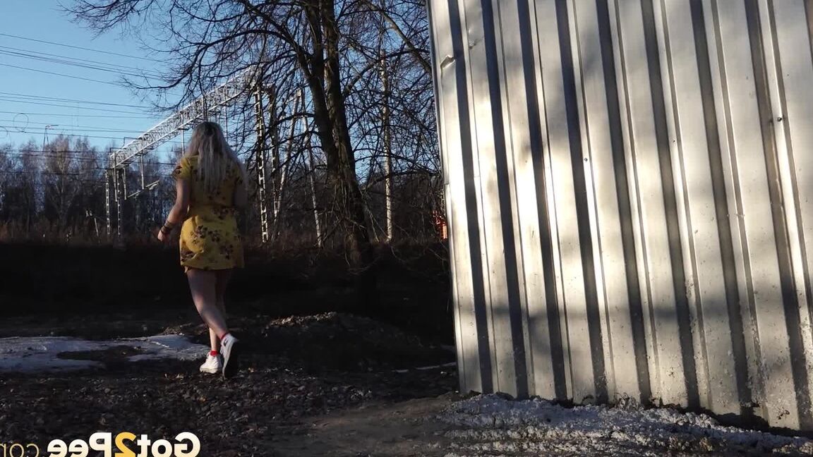 15P Blonde babe stands and pees while being filmed