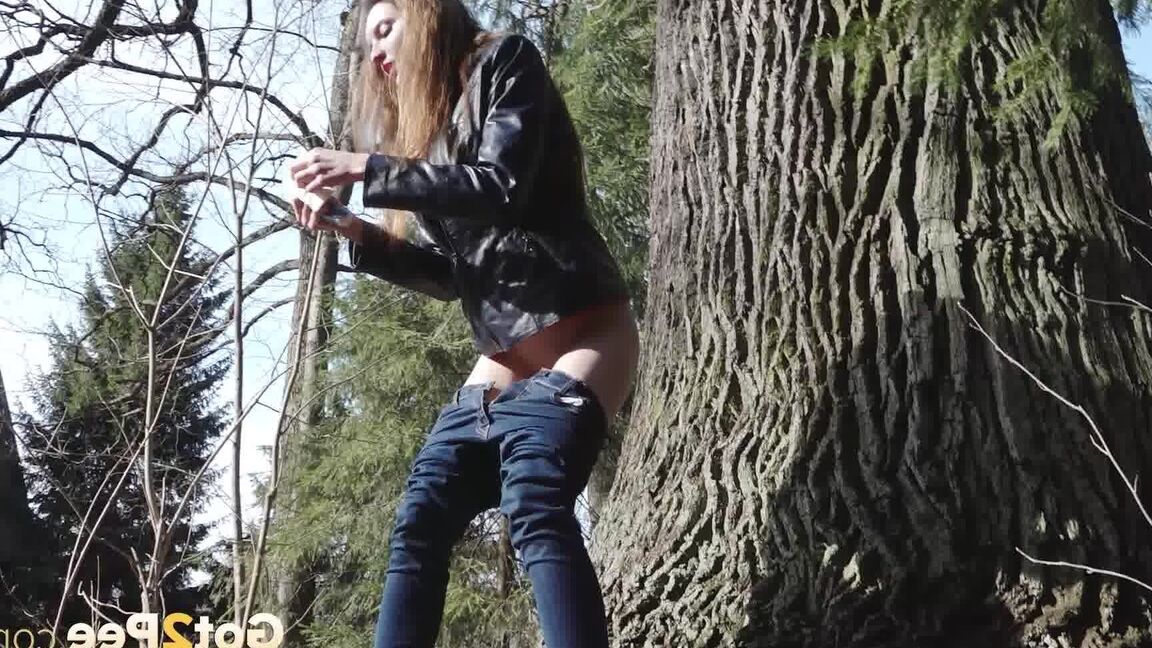 15P Brunette babe squats and pees on the ground