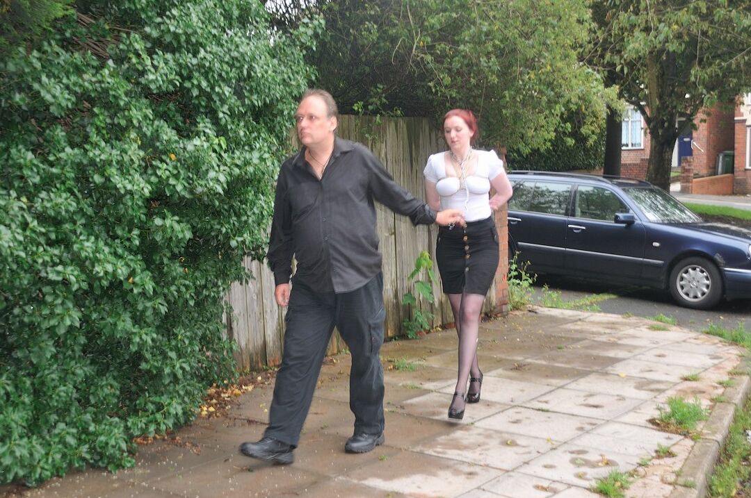 16P Redhead licks her Master's boots in parking lot before crawling on all fours