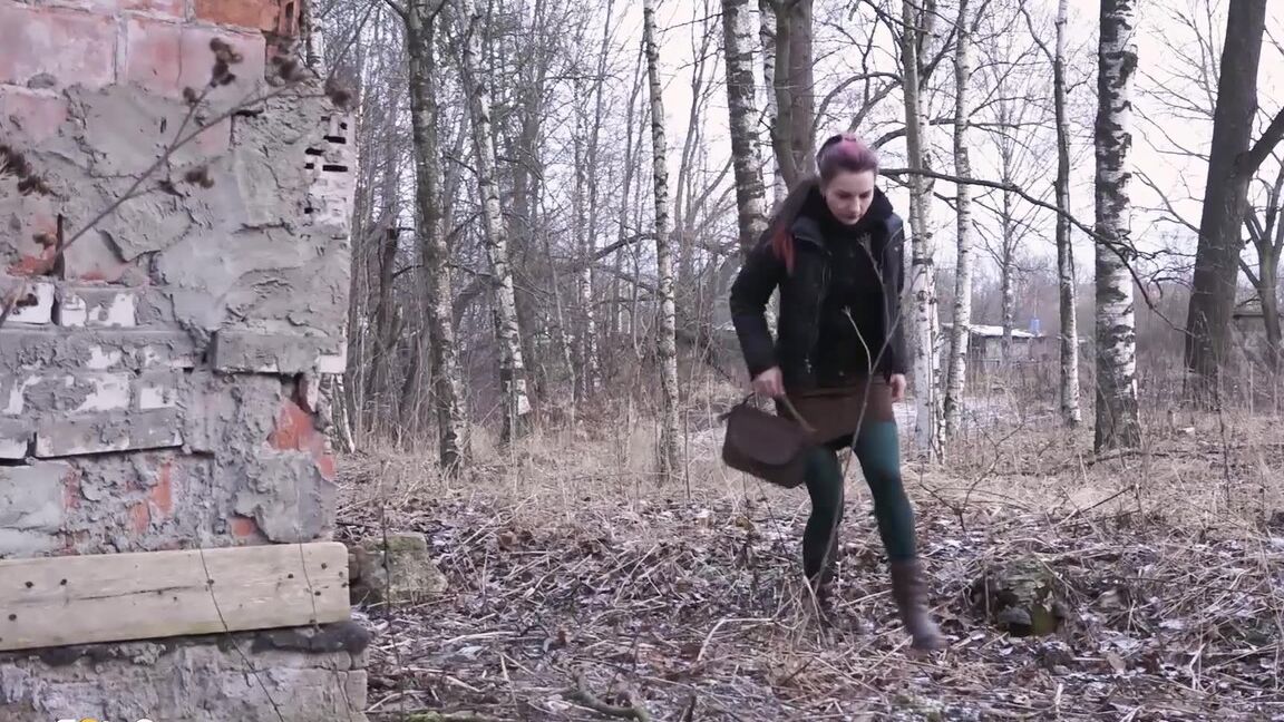 15P Caucasian girl pulls down her tights for a piss behind an abandoned building
