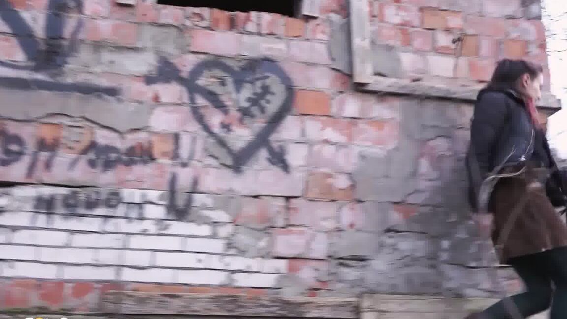 15P Caucasian girl pulls down her tights for a piss behind an abandoned building