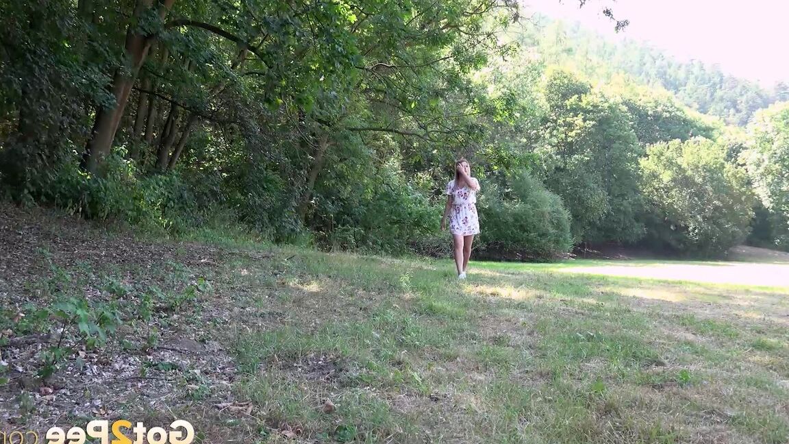 15P White girl Nikki Dream takes a piss in a field while out for a walk