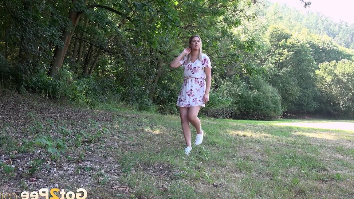 15P White girl Nikki Dream takes a piss in a field while out for a walk