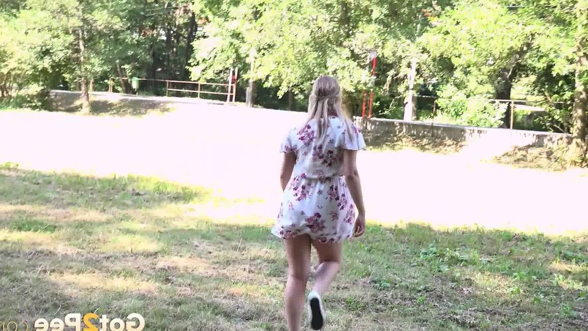 15P White girl Nikki Dream takes a piss in a field while out for a walk