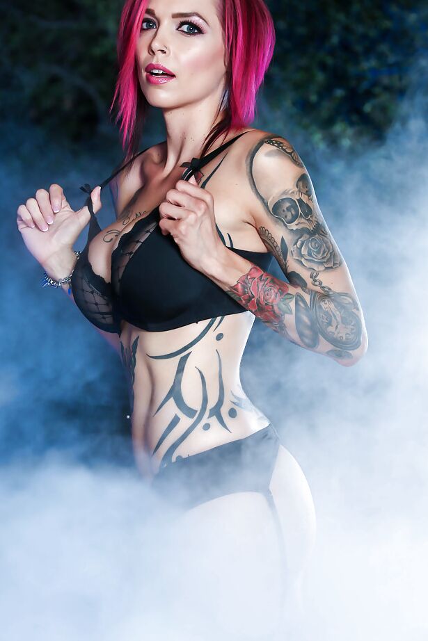 16P Tattooed redhead babe Monique Alexander exposes large tits and pierced nips