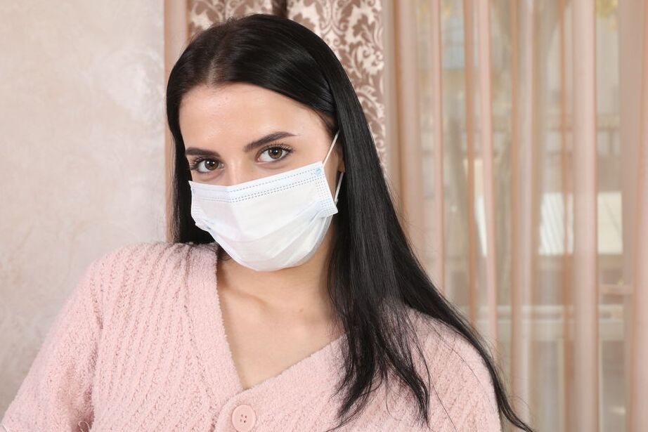 16P Young brunette Sofi Li removes a surgical mask before posing nude in socks