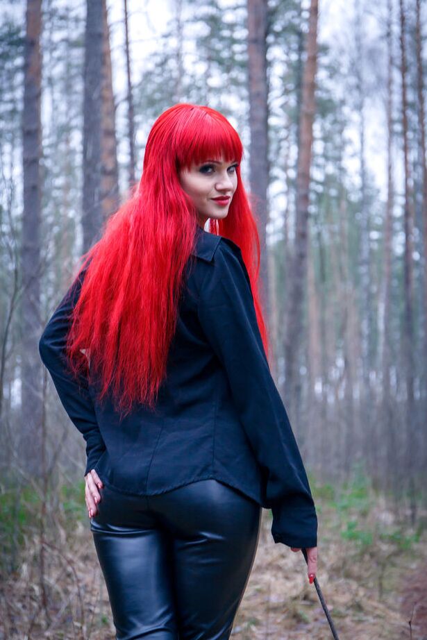 16P Redhead Ferggy pulls down leather pants to get at her horny cunt in the woods