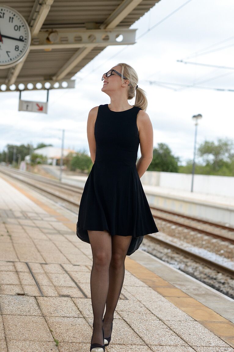 21P Kinky MILF Aston inserts glasses in her cunt while waiting for a train to come