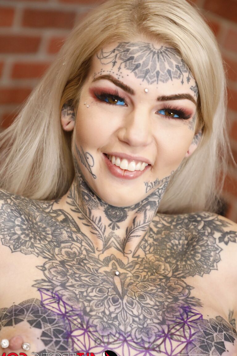 16P Blonde girl Amber Luke toys her twat after getting a new tattoo in a studio