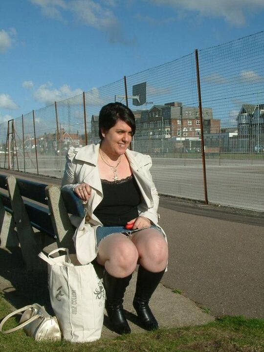 12P Overweight brunette masturbates on a public bench somewhere in the UK