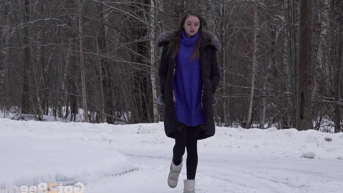 15P Caucasian girl pulls down her leggings to take a piss on snow-covered ground