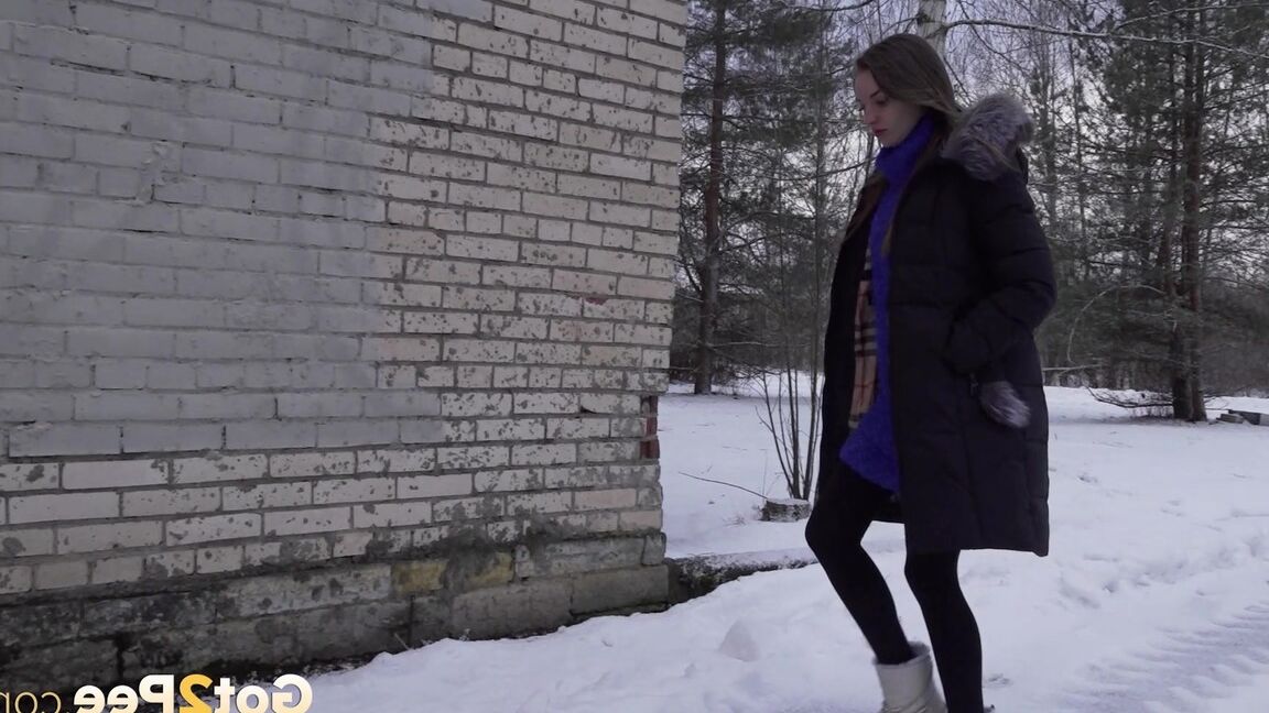 15P Caucasian girl pulls down her leggings to take a piss on snow-covered ground