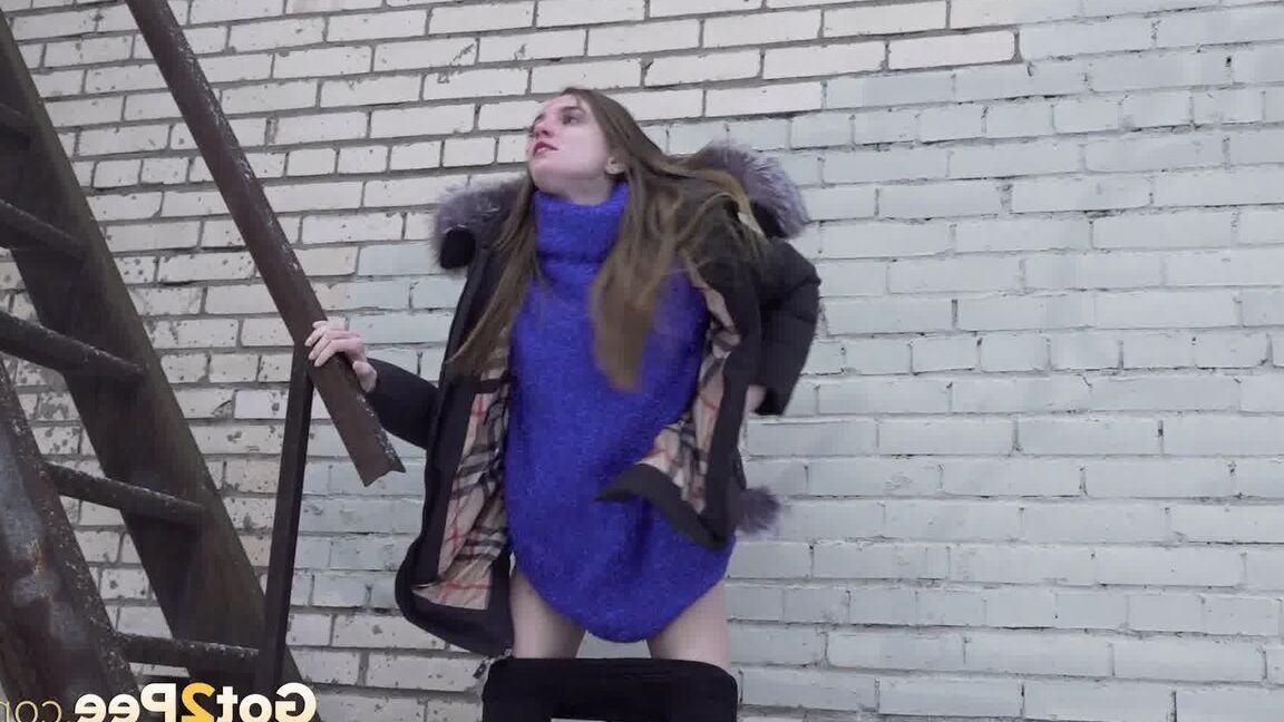 15P Caucasian girl pulls down her leggings to take a piss on snow-covered ground