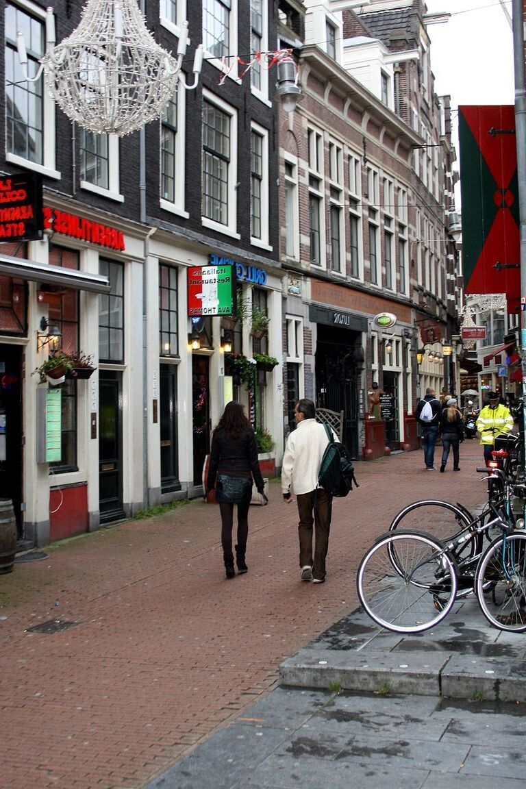 15P Visiting sex tourist pick up a couple of hookers from the red light district