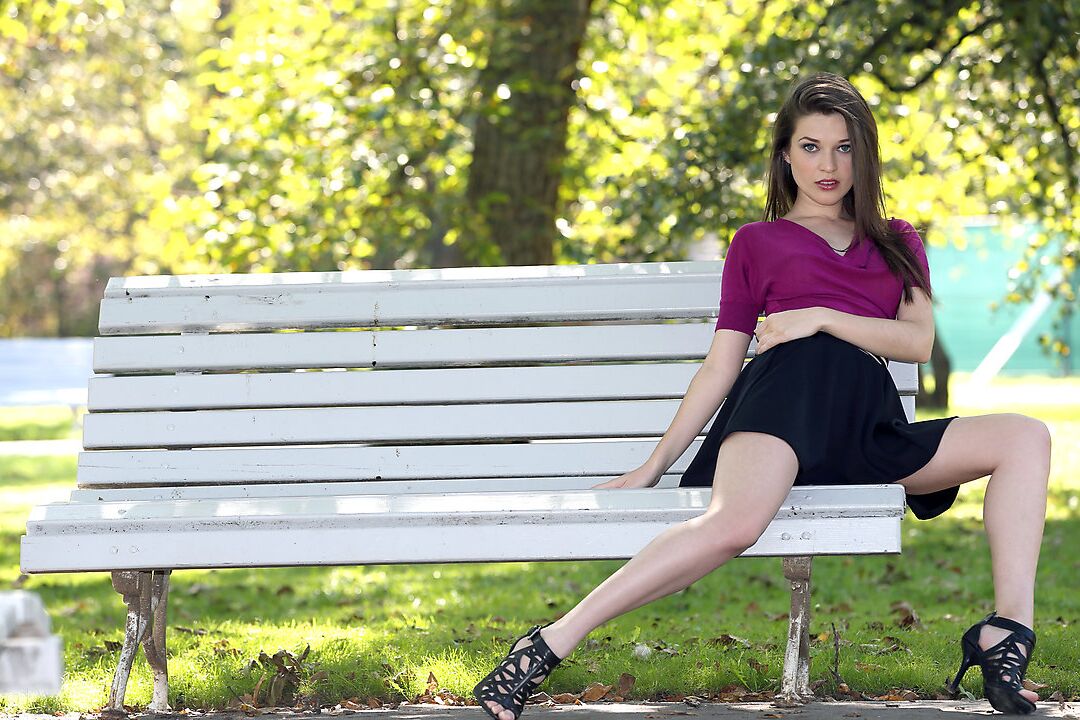 16P Clothed chick shows off her bare legs in a miniskirt and high heels in public