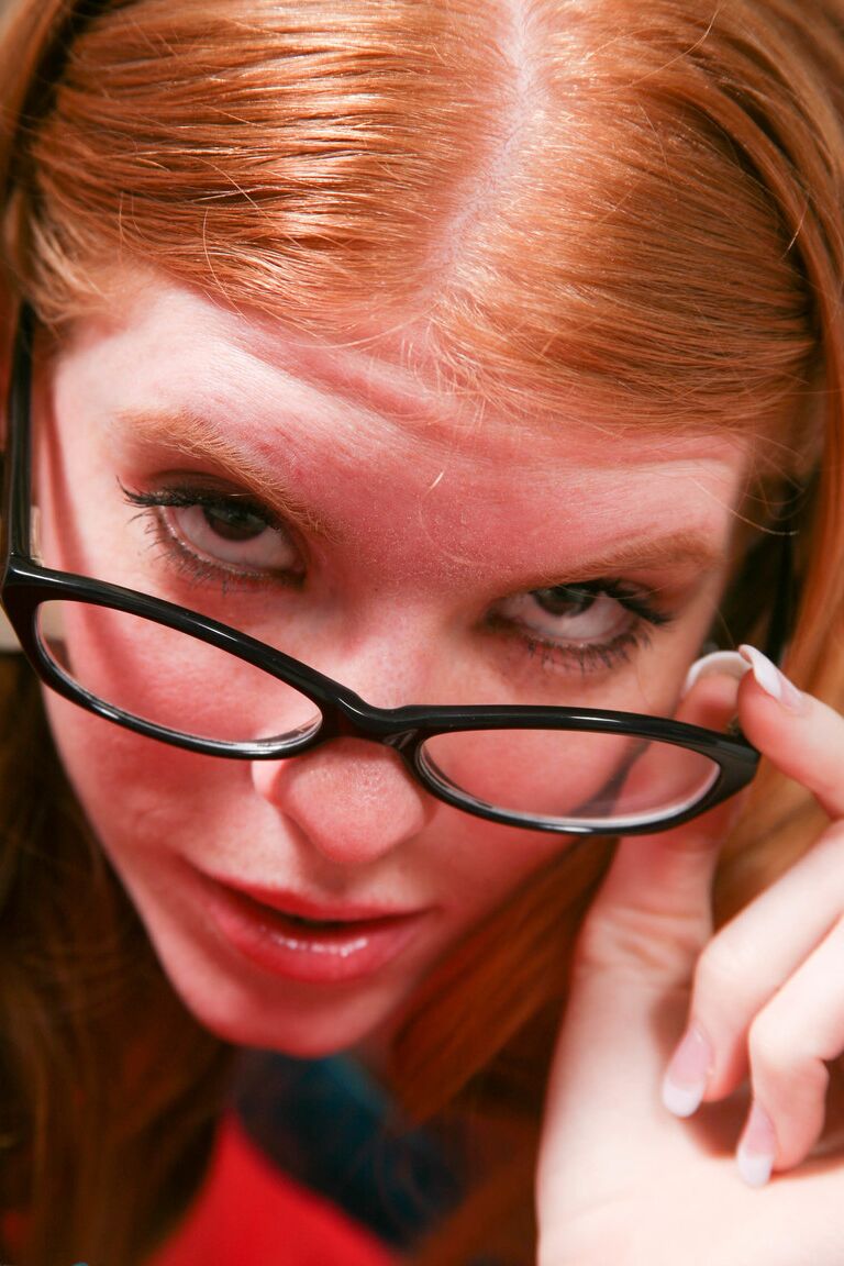 16P Natural redhead wears cum on glasses after jerking on a penis