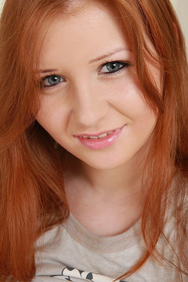 20P Innocent redhead Jess shows her big tits and masturbates with a dildo