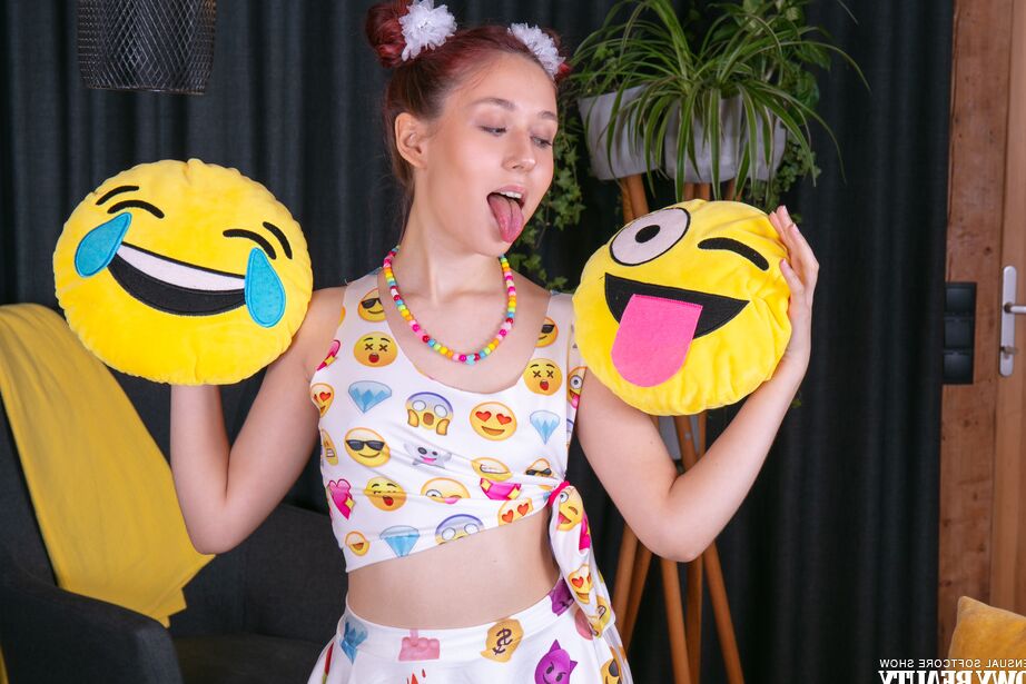 20P Young looking redhead Lexi gets naked while sporting puffballs