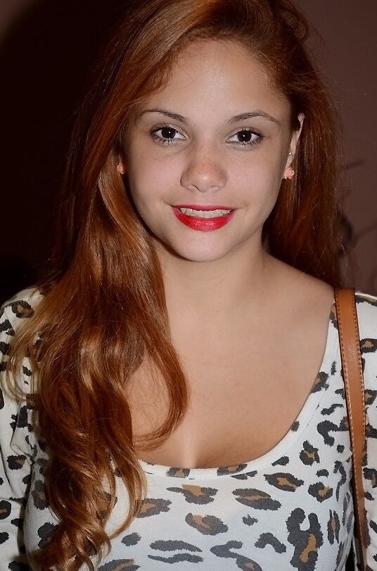 12P Sweet big tit ginger babe is smiling and showing her body