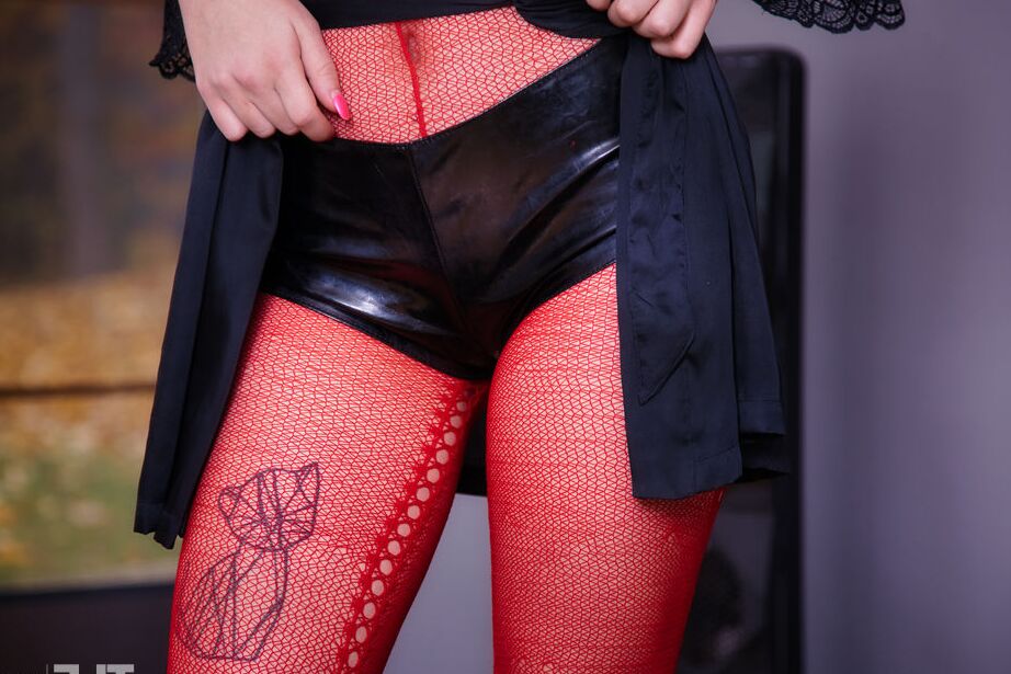 16P Hot redhead Nessie masturbates while wearing a crotchless bodystocking