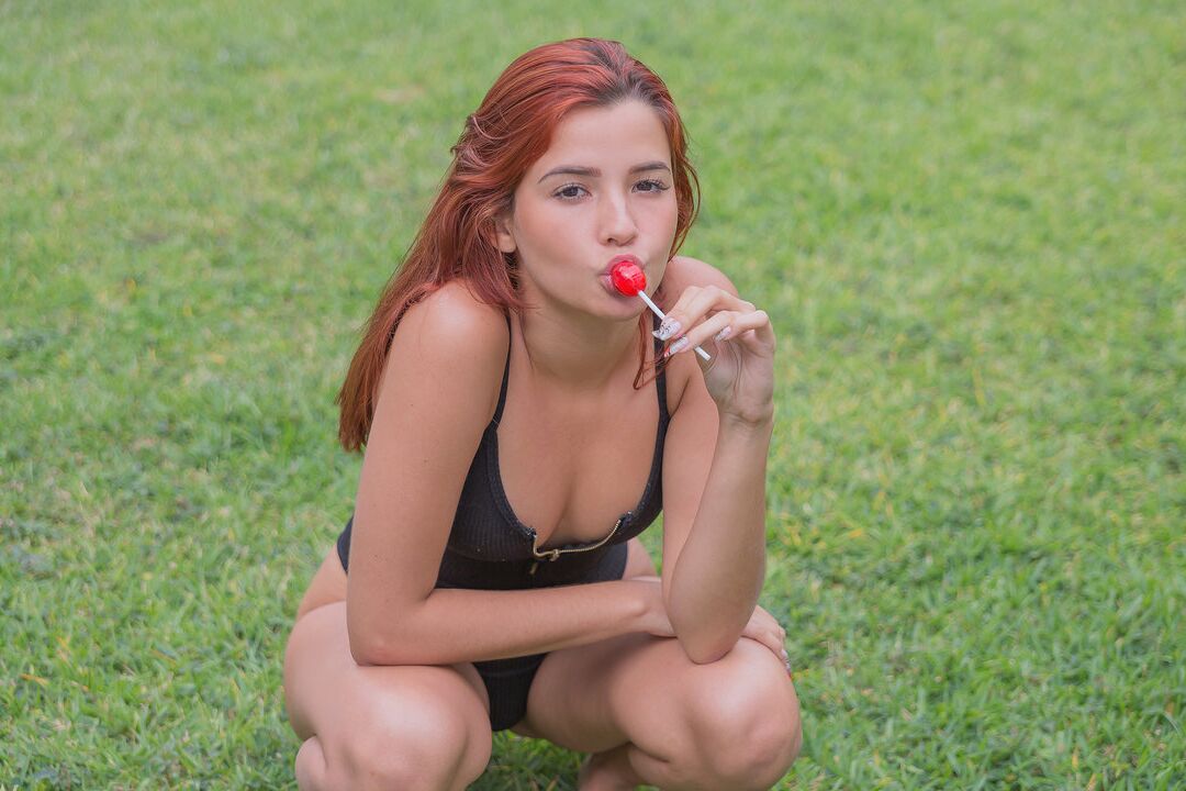 16P Sexy redhead Agatha Vega sucks a sucker before squirting while masturbating