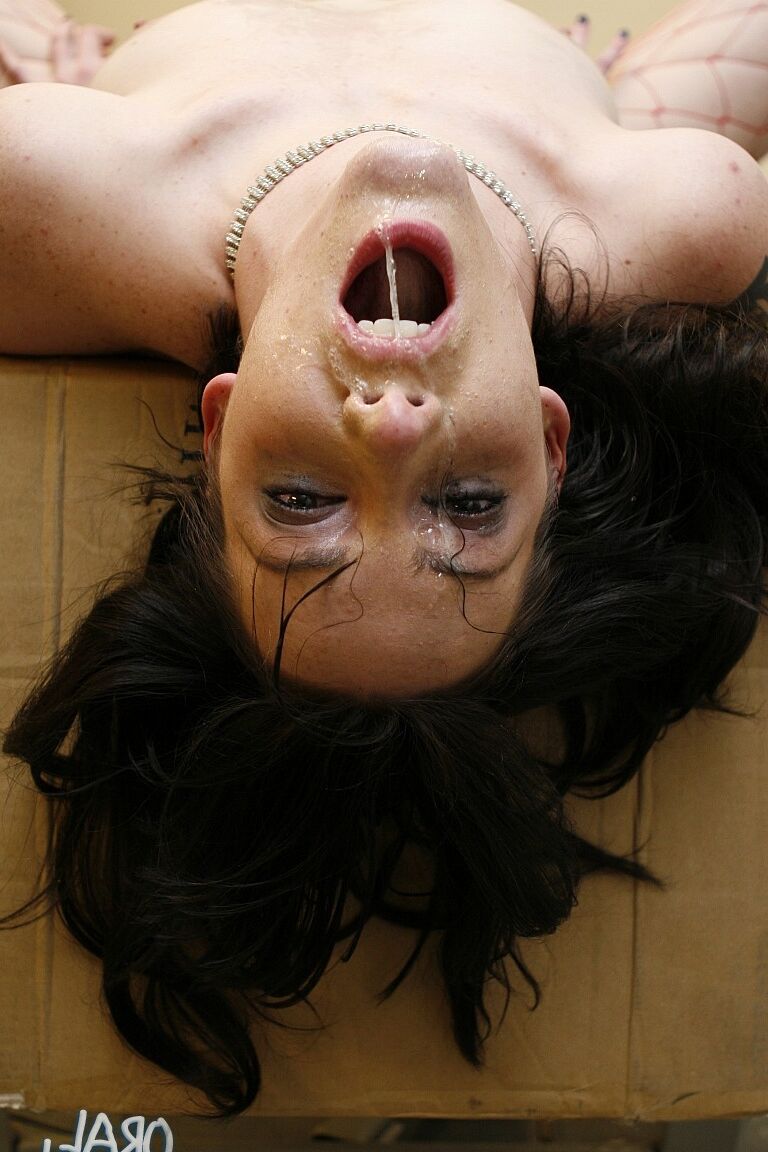 14P Latex-clad sinner Audrey Elson gets her face brutally fucked by huge cocks