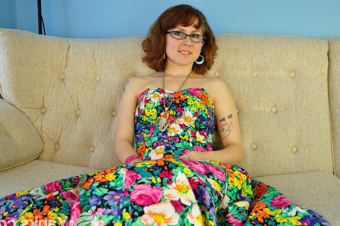 15P Redheaded first timer keeps her glasses on while showing her naked pussy