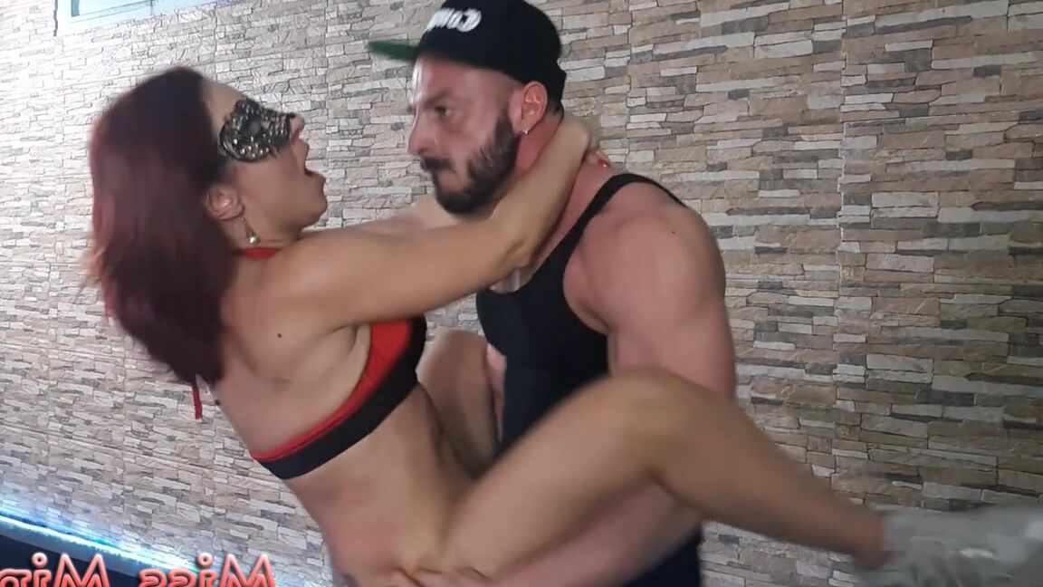 15P Sexy masked redhead Miss Mina gets her twat filled from behind on a chair