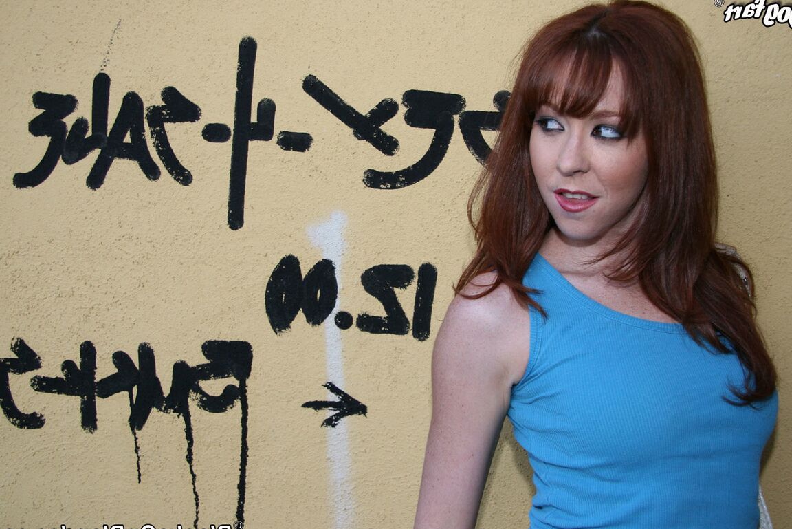 15P Natural redhead Trinity Post has interracial sex after discovering a gloryhole