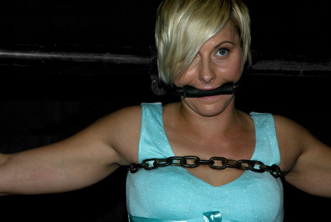 17P Blonde female Vendetta is topped by Claire Adams in a maternity bra