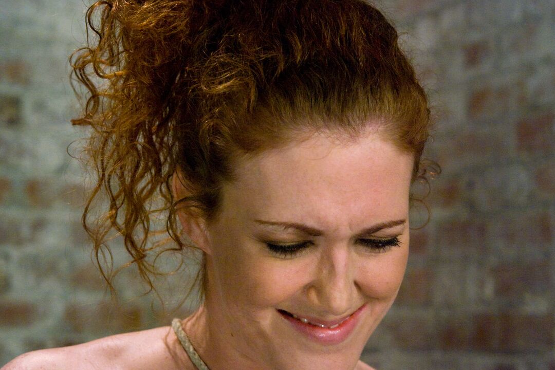 21P Redhead babe Sabrina Fox gets her tits abused while hanging from the ceiling