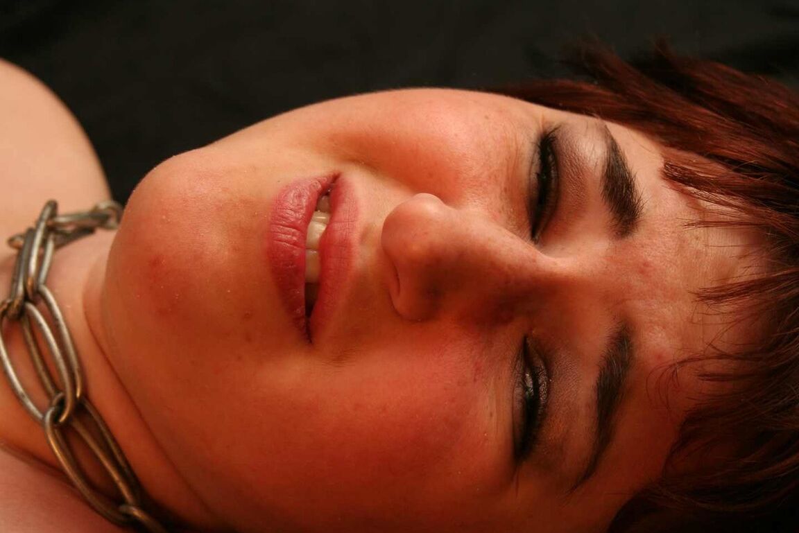 16P Redhead female is spanked after being covered in candle wax