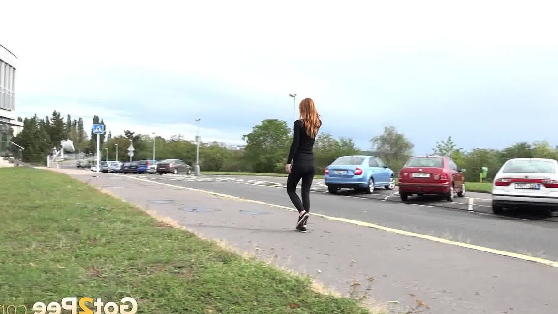 15P Black clad Sandra in glasses pauses to pee behind some trees on the street