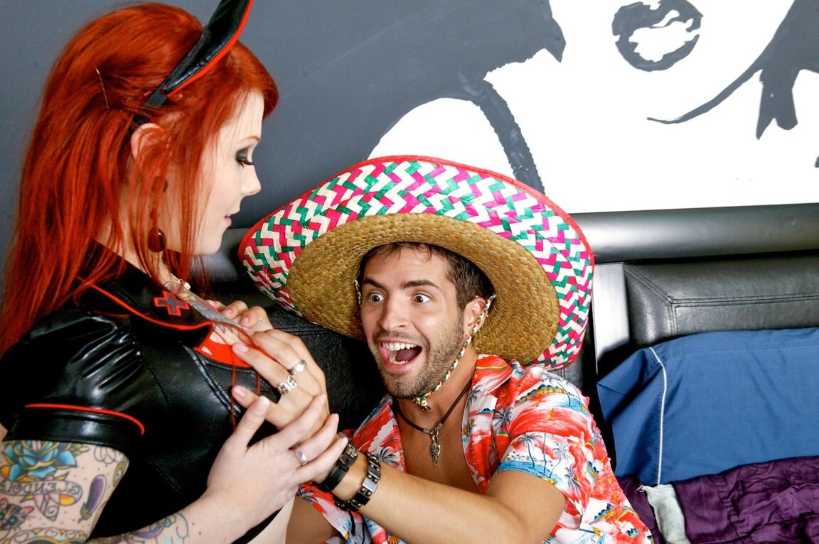 14P Tattooed redhead Misti Dawn seduces a man that's wearing a sombrero