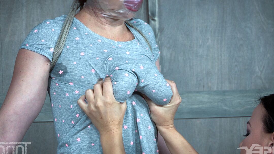 14P Restrained and gagged female is tortured and fucked by another woman