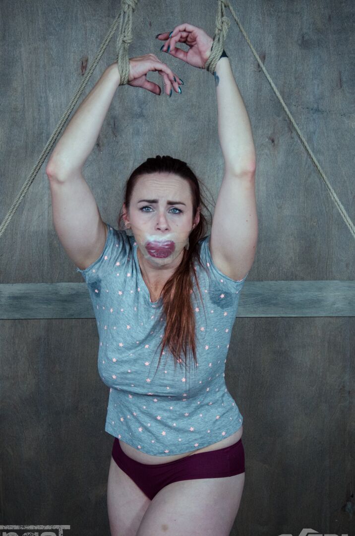 14P Restrained and gagged female is tortured and fucked by another woman