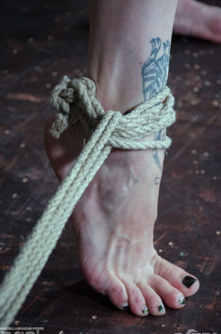 14P Restrained and gagged female is tortured and fucked by another woman