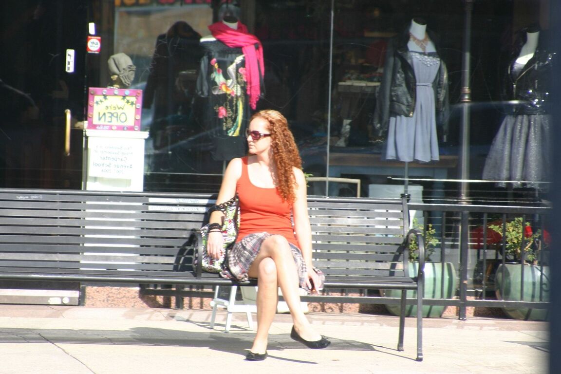 17P Redhead vixen Kitty Caulfield shows long legs in a short skirt in public