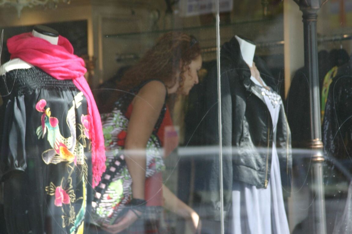 17P Redhead vixen Kitty Caulfield shows long legs in a short skirt in public