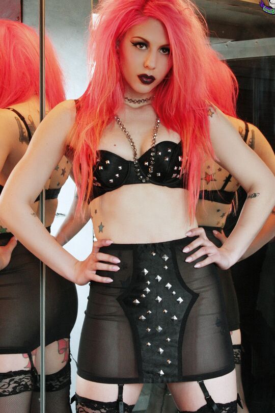 15P Solo model Annalee Belle sports dyed hair while going topless afore a mirror