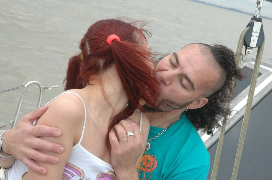16P Young looking redhead fills her mouth with cum after fucking on a boat