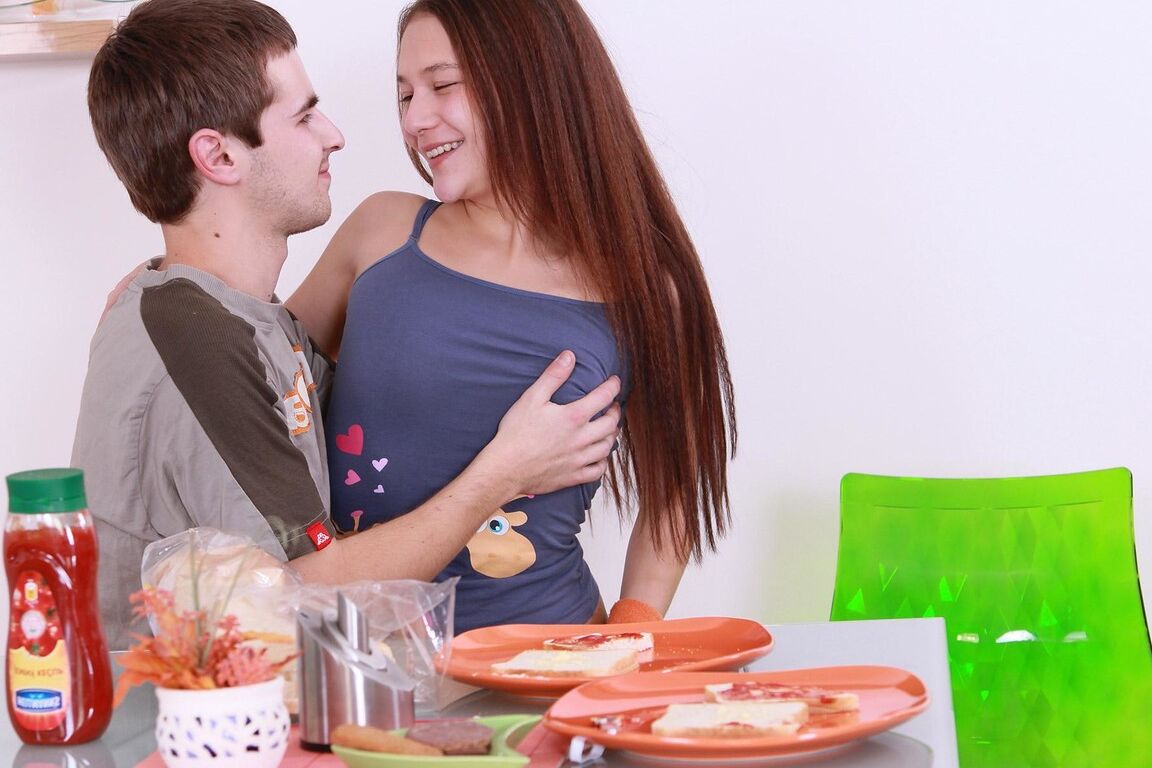15P Young looking redhead engages in foreplay with her guy before riding his cock
